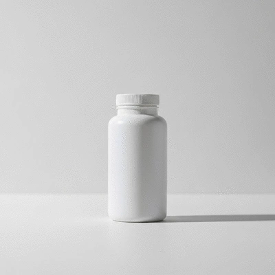 African mango supplement capsules in a clean white bottle